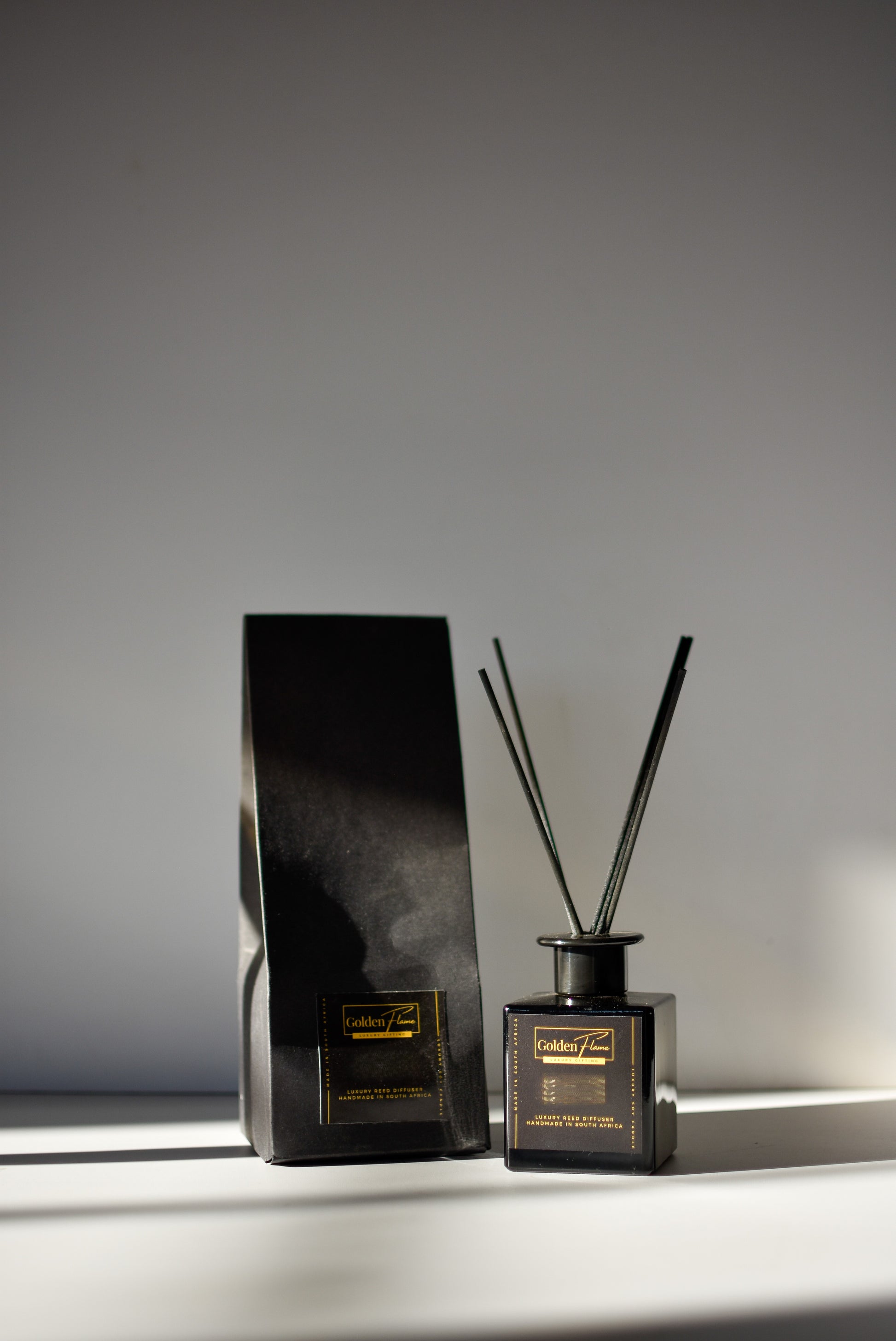 Pomegranate & Sage Reed Diffuser in black glass bottle